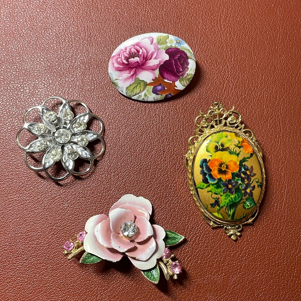 Collection of Four vintage pins.